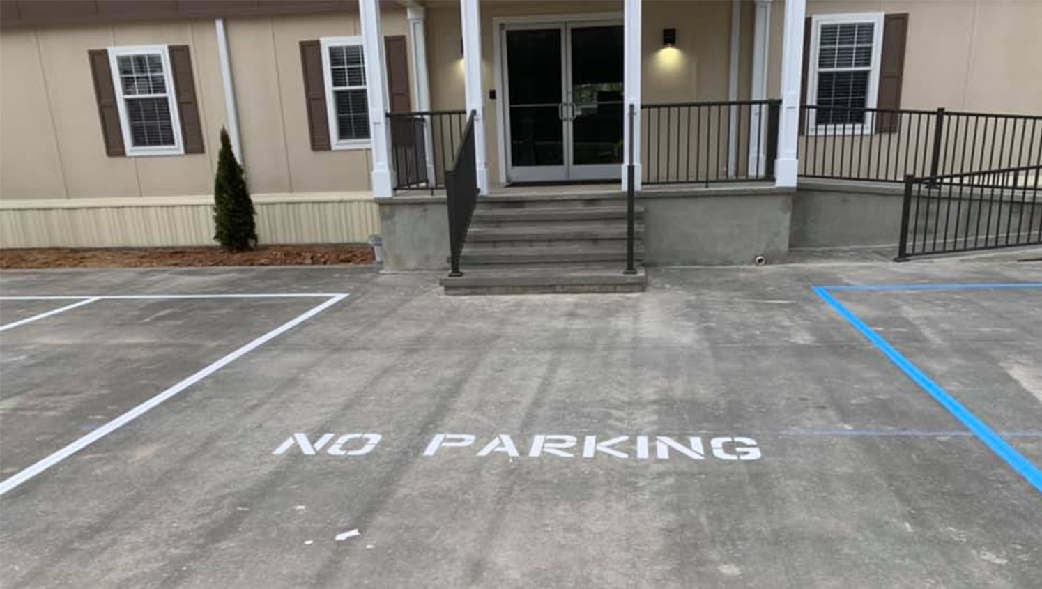 no parking stencil at bank