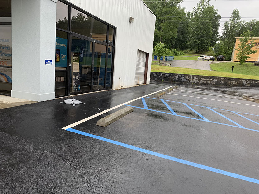 after wheel stop installation and ada striping at at&t jacksonville al