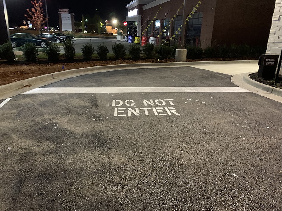 pavement marking reading “do not enter” at Panda Express in Athens AL