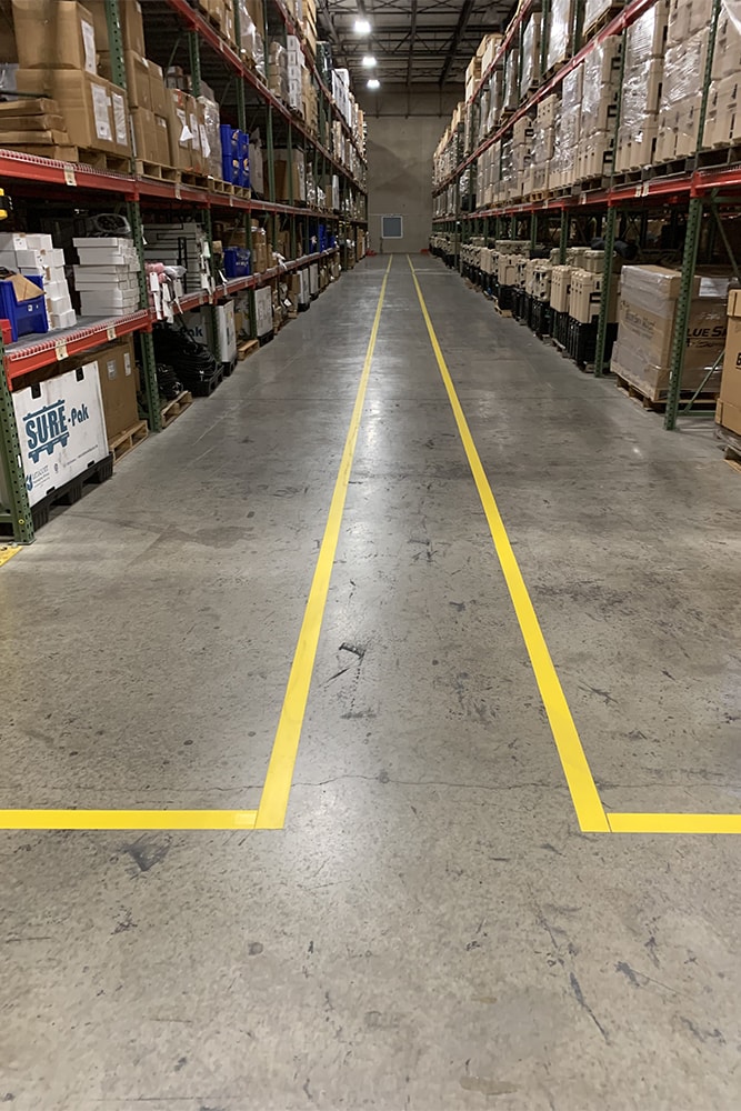 newly marked pedestrian walkway in Madison, AL warehouse