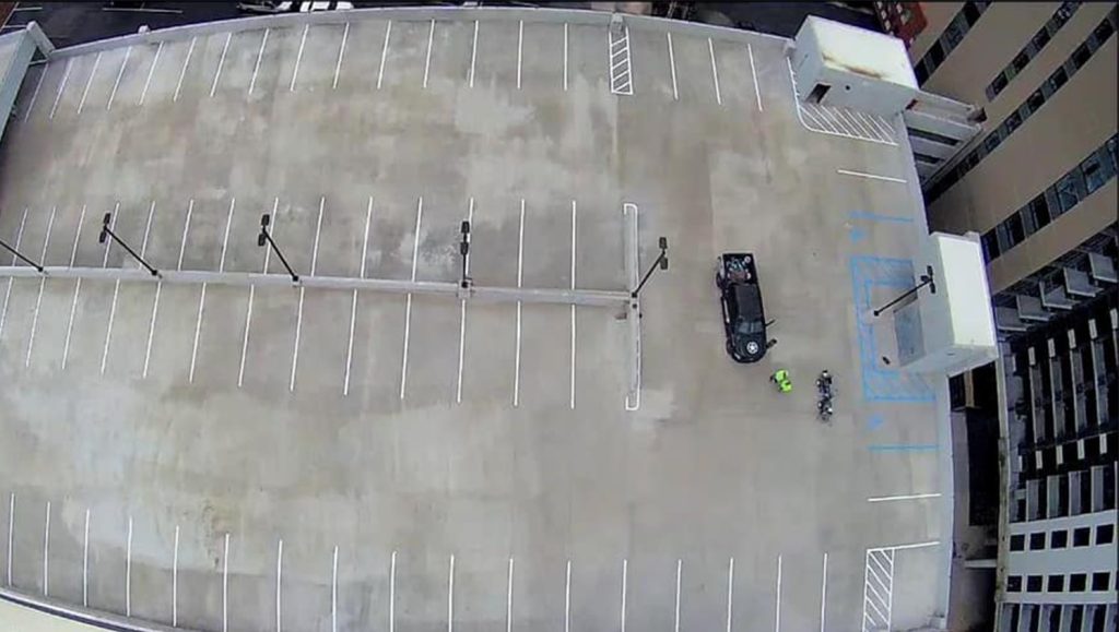 hazard lines around parking garage curb