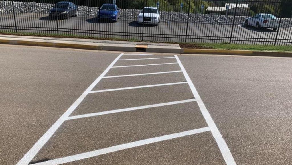 crosswalk striping project at business facility