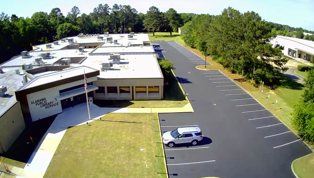 recently seal-coated Alabama Public Library Service parking lot