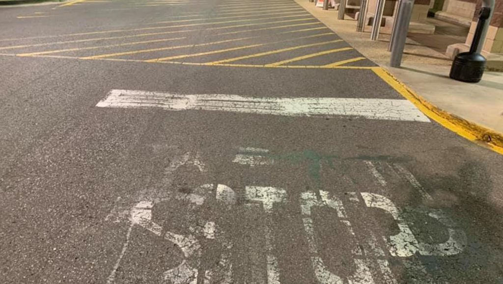 faded stop bar in shopping center