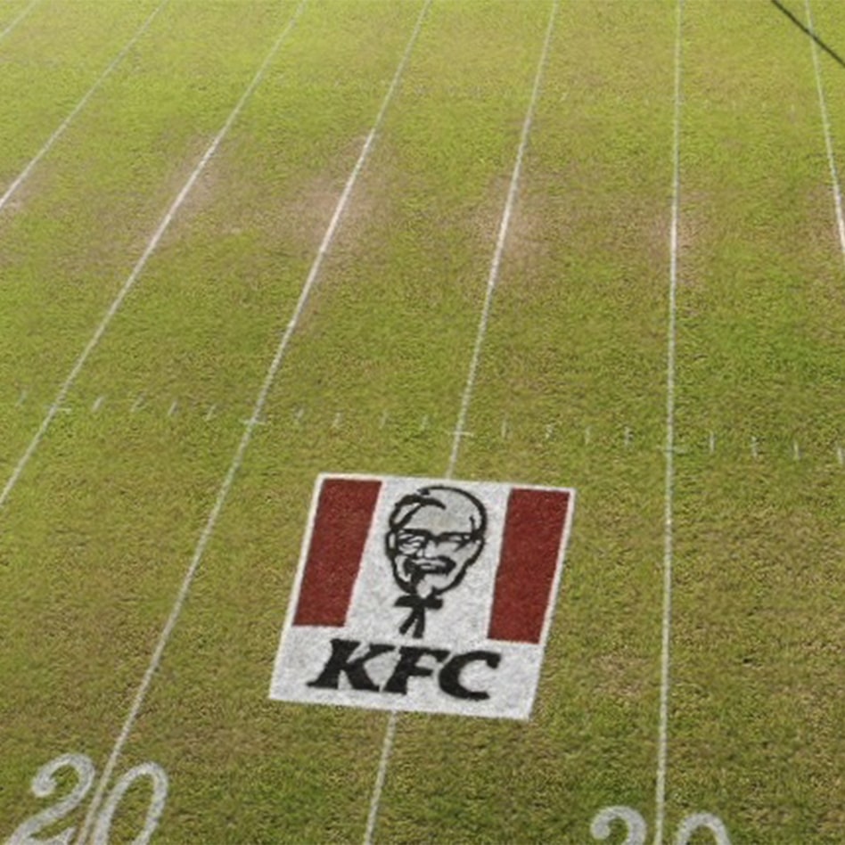 close-up of KFC logo striped on Bethlehem Christian Academy’s football field