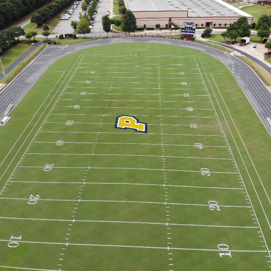 Side shot of newly striped football field at Prince Avenue Academy