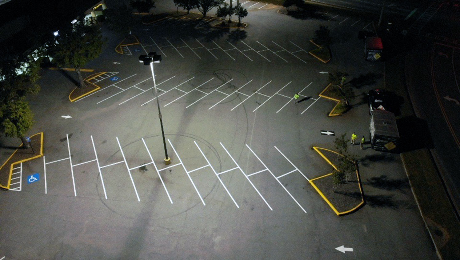re-striped parking spaces and arrows shown from above