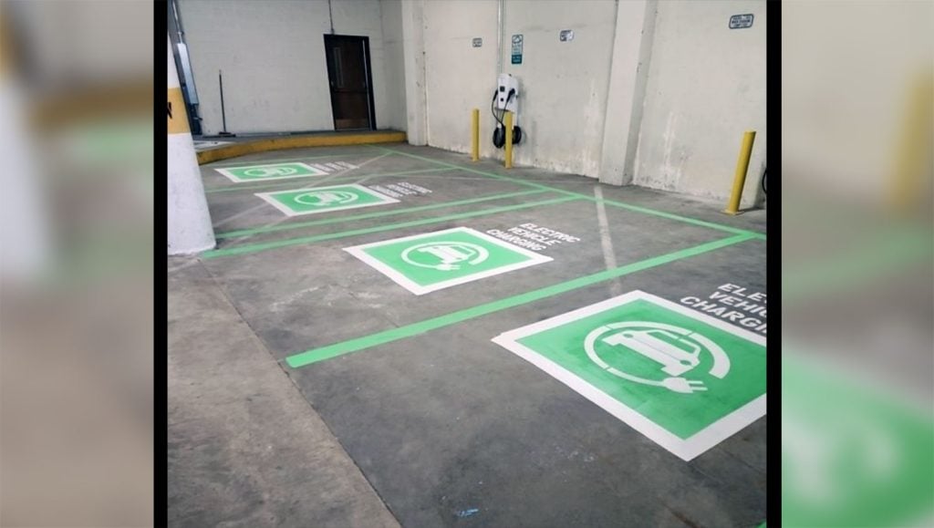 faded electric vehicle line striping
