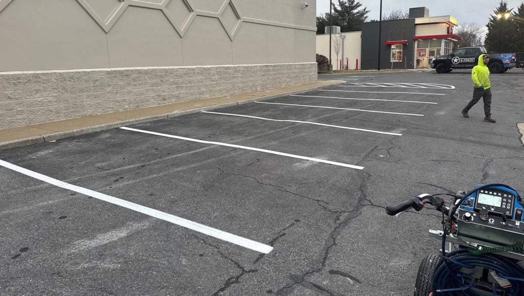 close-up of parking spots freshly painted for dollar tree