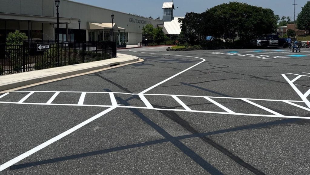 freshly painted line markings for Greater Grace Christian Academy parking lot