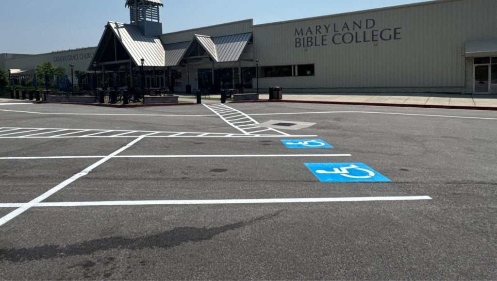 ada compliance parking spots freshly painted for Greater Grace Christian Academy