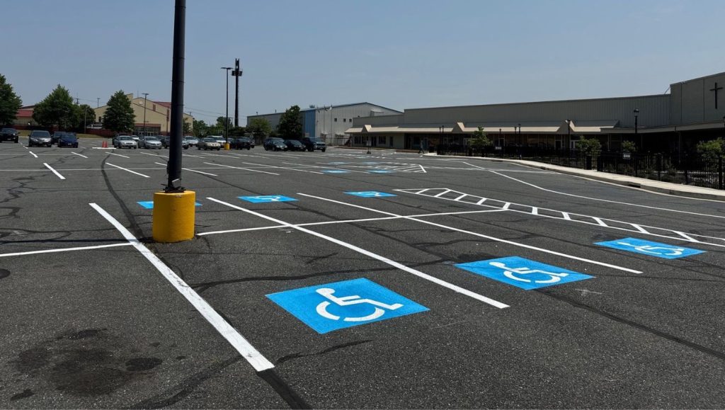 ada compliance parking spots freshly painted for Greater Grace Christian Academy