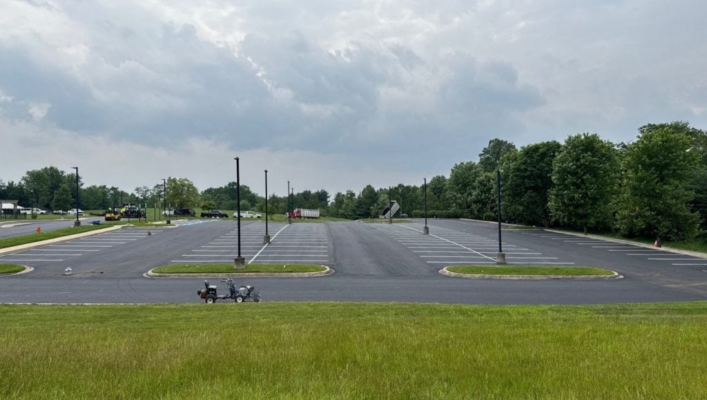 S.E.J. Paving parking lot with freshly painted line markings