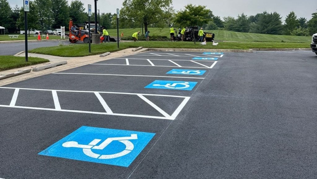 ada compliance parking spots freshly painted for S.E.J. Paving