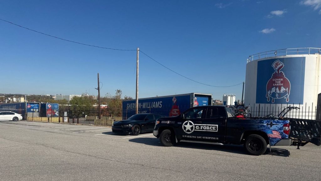 G-FORCE® vehicles in front of Sherwin Williams