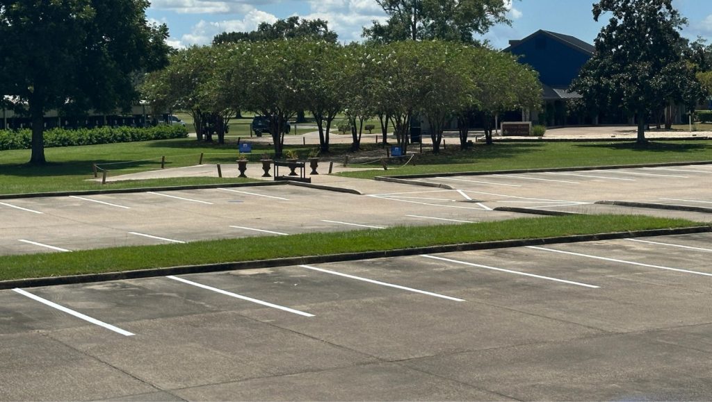 parking spots freshly painted for Les Vieux Chenes Golf Course close-up