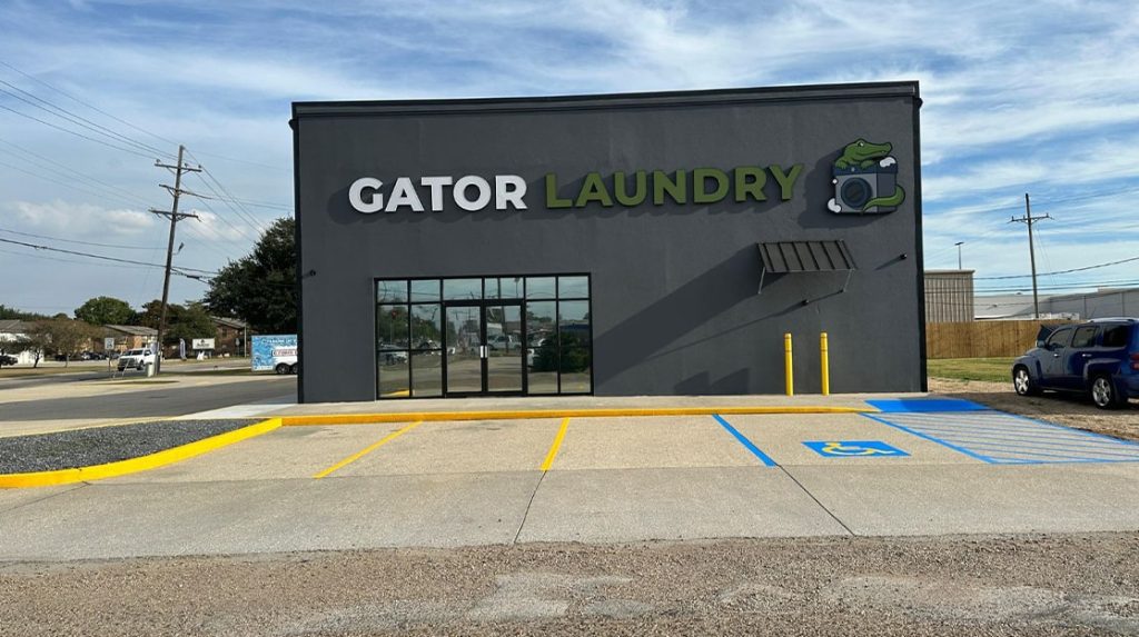 front view of Gator Laundry parking lot freshly painted