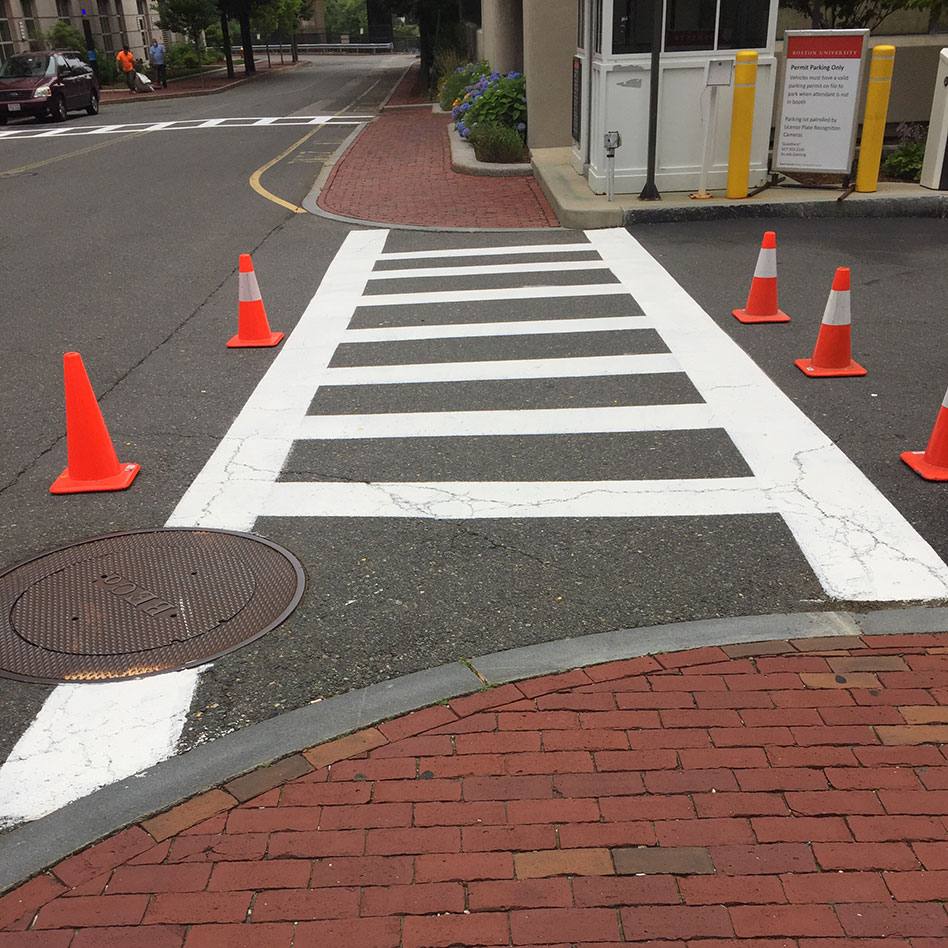 cones surrounding re-painted crosswalk at Boston University