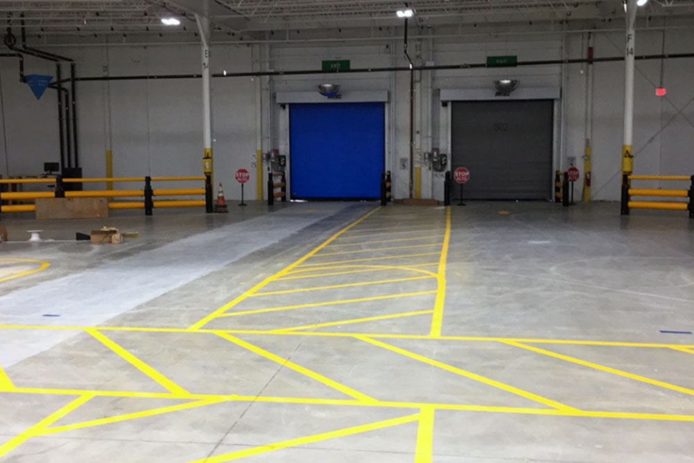 new warehouse floor striping added inside Amazon/Northpoint Construction’s
