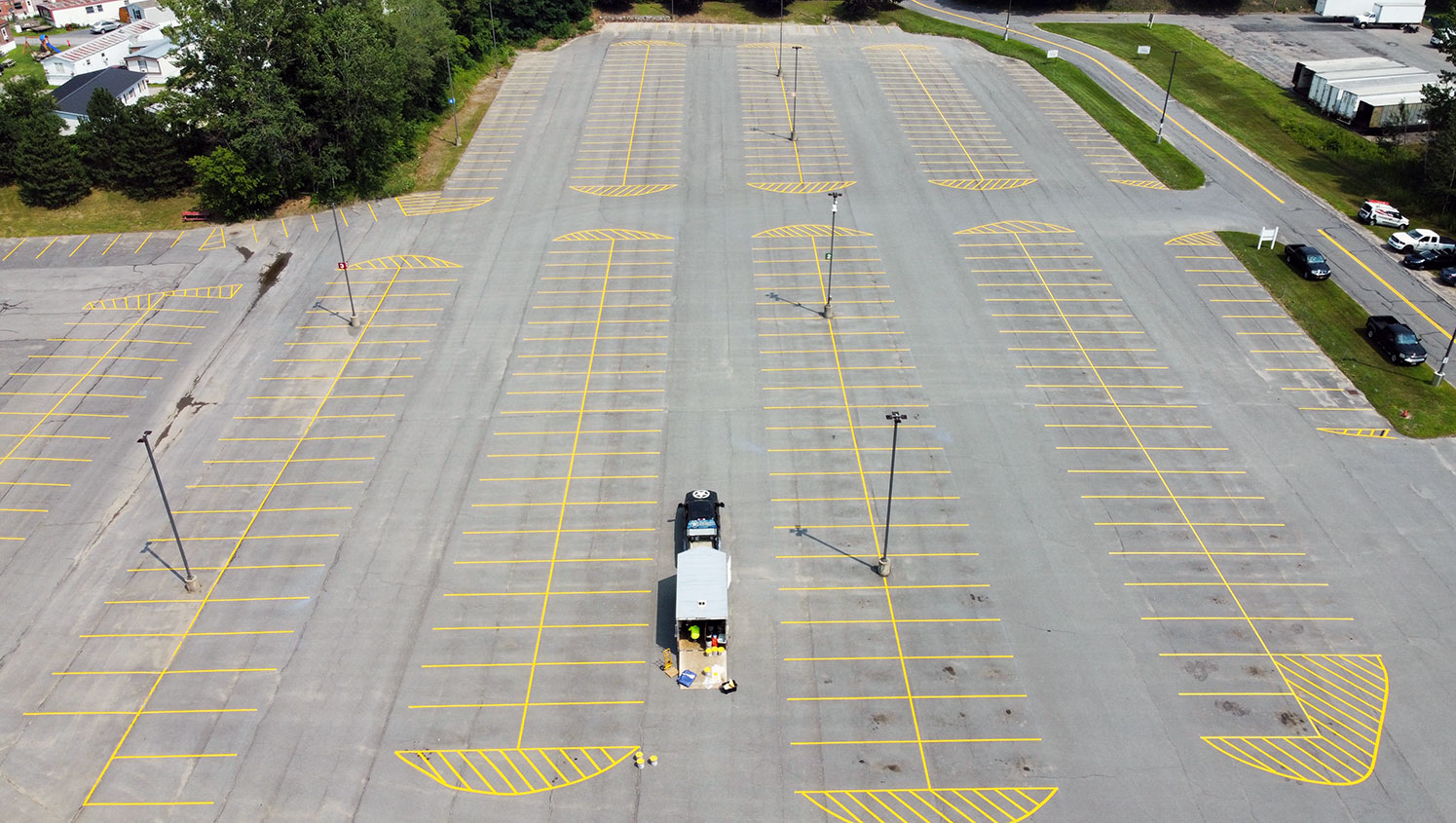 parking lot with freshly painted stalls at a transportation facility