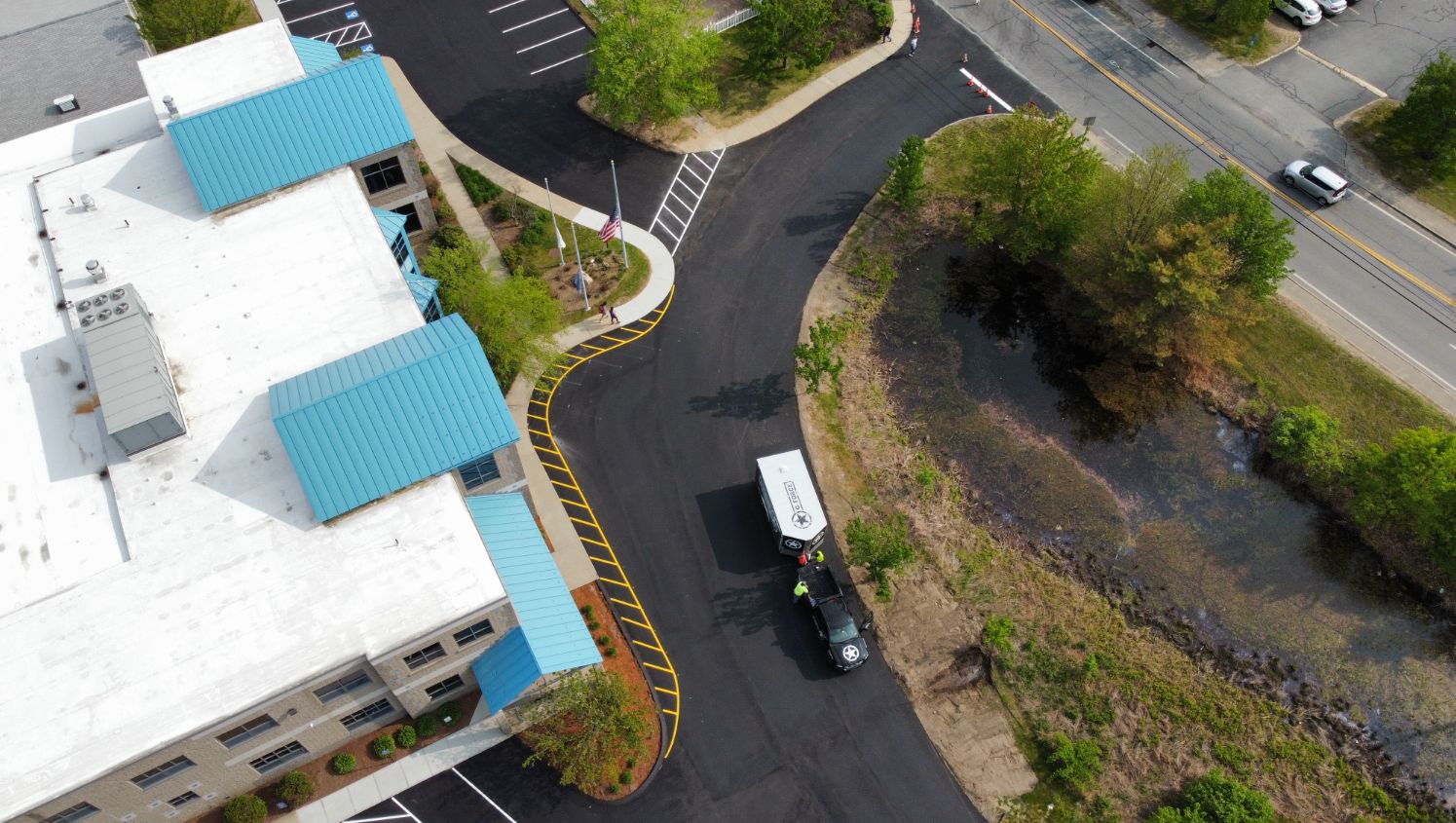 aerial view of the parking lot with yellow hatches