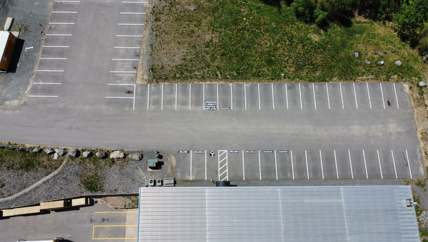 an aerial view of customer parking spaces
