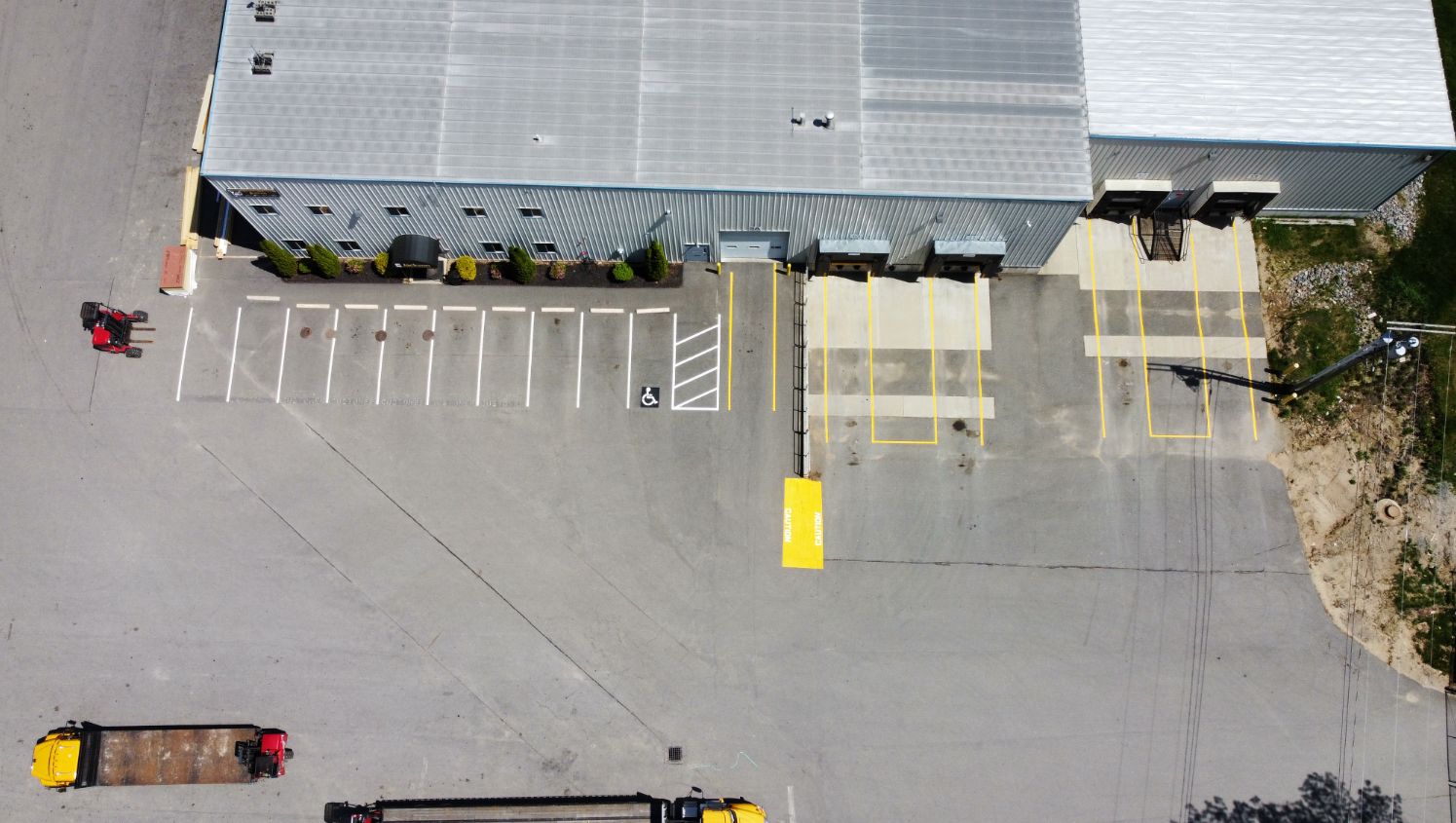 an aerial view of new parking stalls