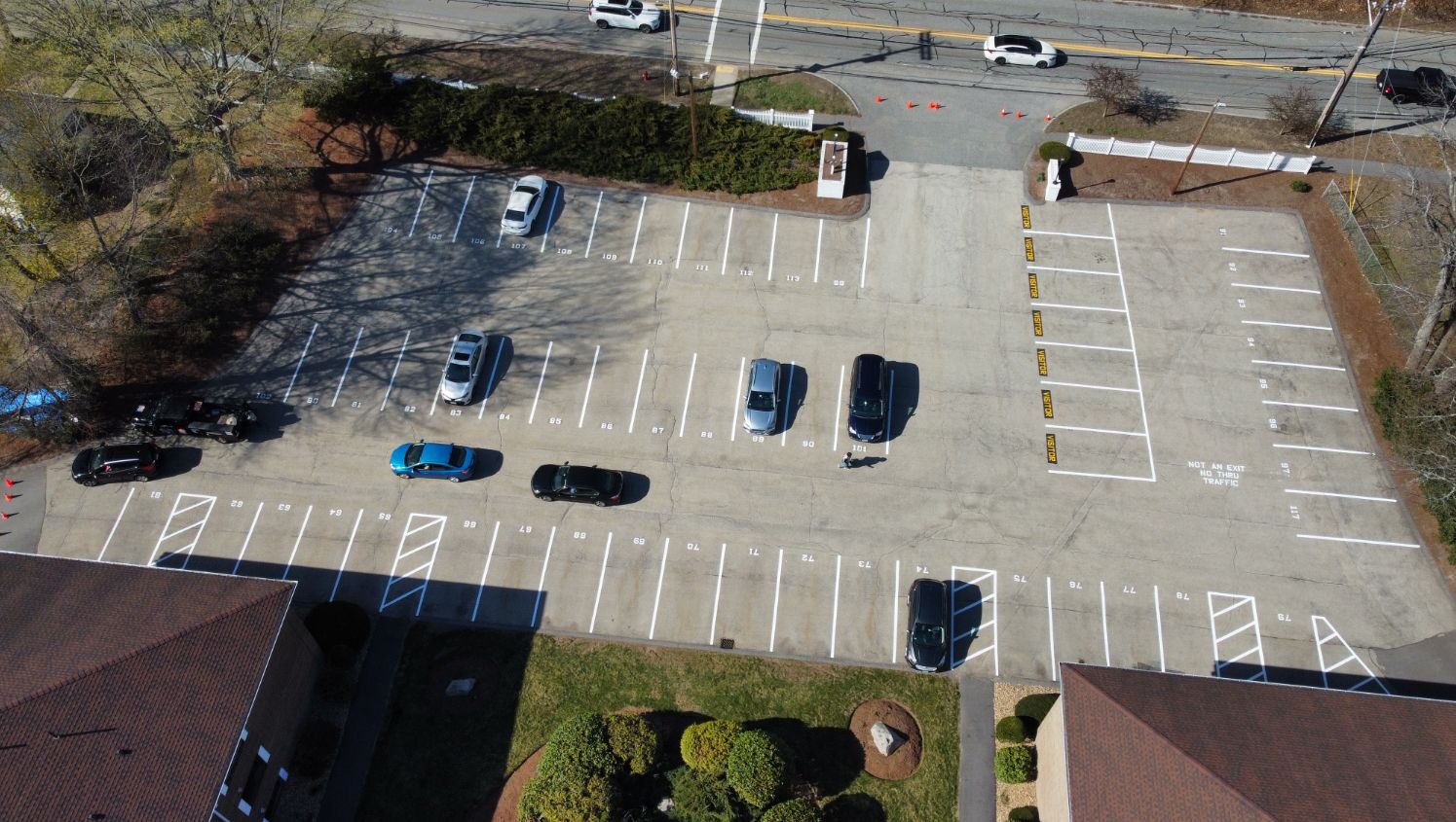 an aerial view of numbered parking spaces