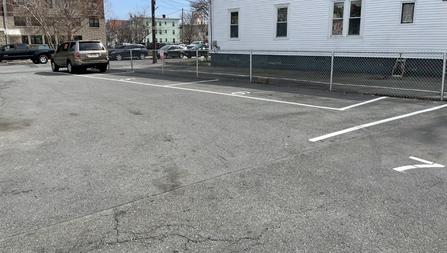 new numbered parking lot spaces