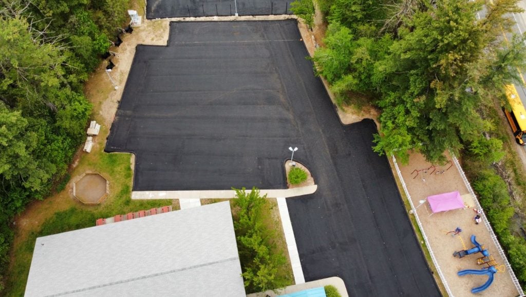 aerial view of the parking lot without lines