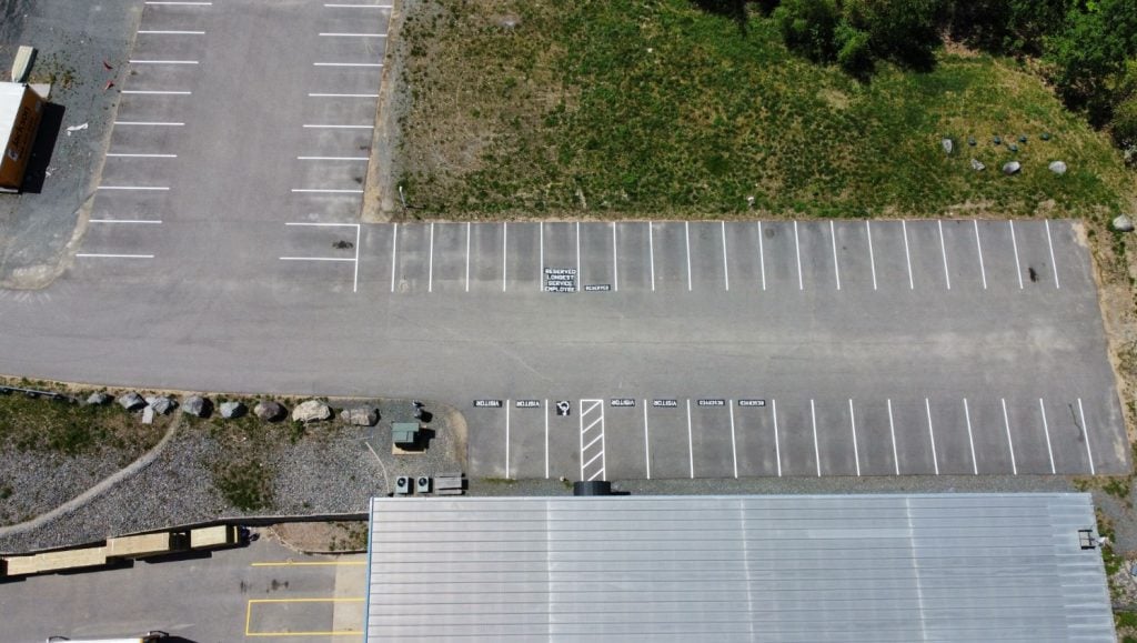 an aerial view of customer parking spaces