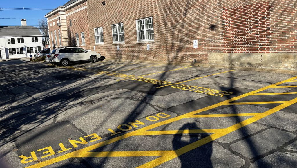 new parking lot striping for designated employee parking