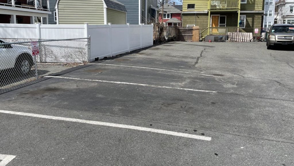 faded parking lot stalls in lynn, ma