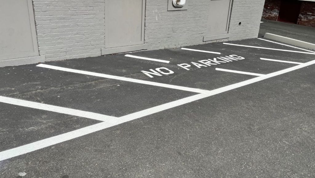 g-force van parked in numbered stall