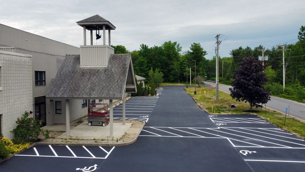 new ADA accessible parking stalls striped at Blackdog Sealcoating in Peterborough, NH