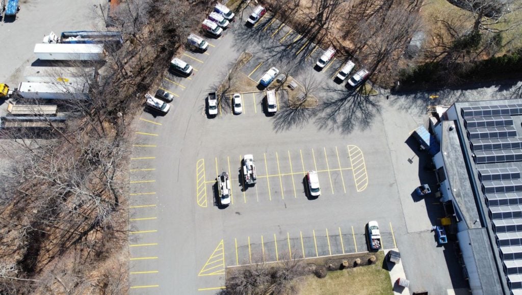 re-striped parking lot markings for woburn, ma comcast facility
