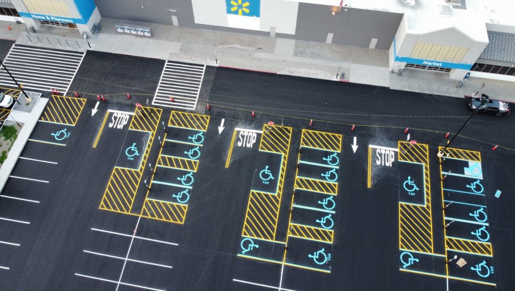 newly striped parking lot markings at a walmart in claremont, nh