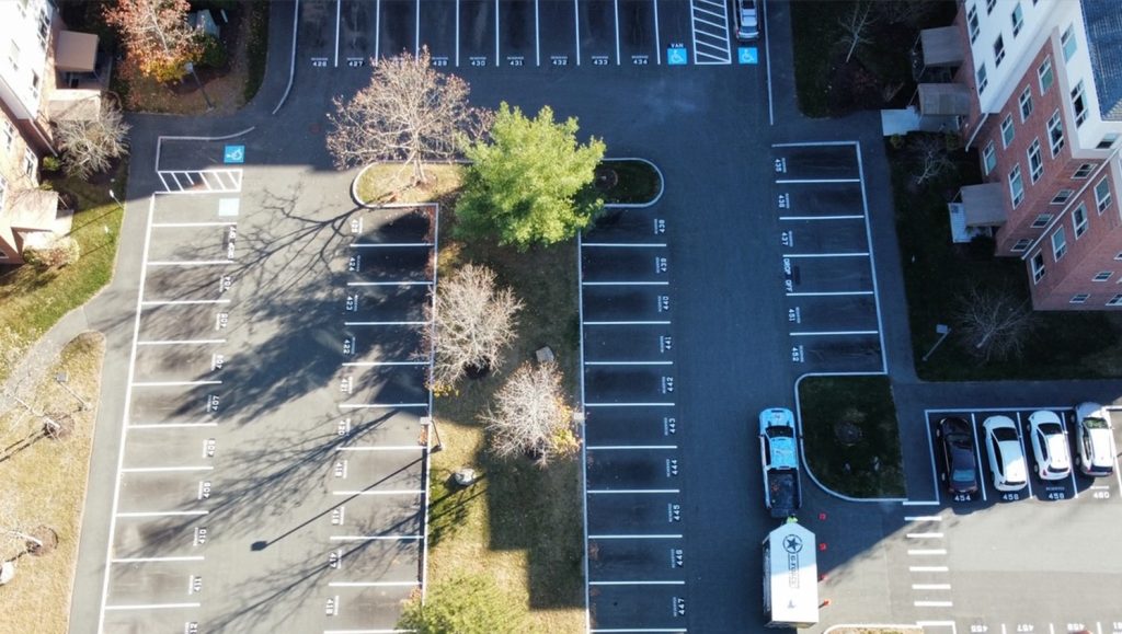 freshly painted line markings for Brooksby Village parking lot aerial view