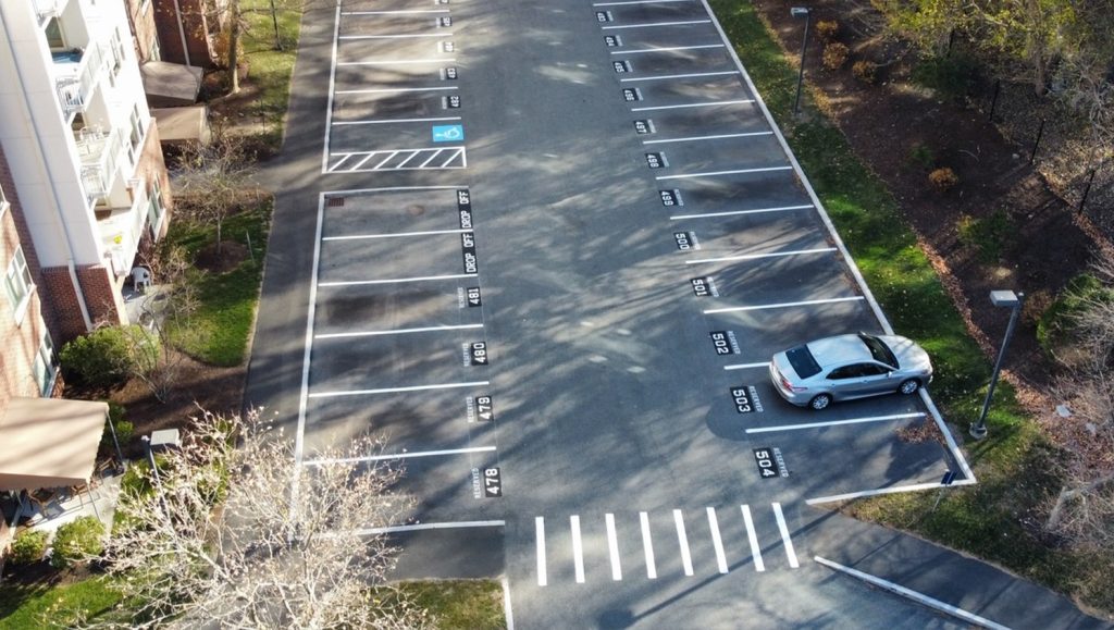 aerial view of Brooksby Village parking lot freshl painted