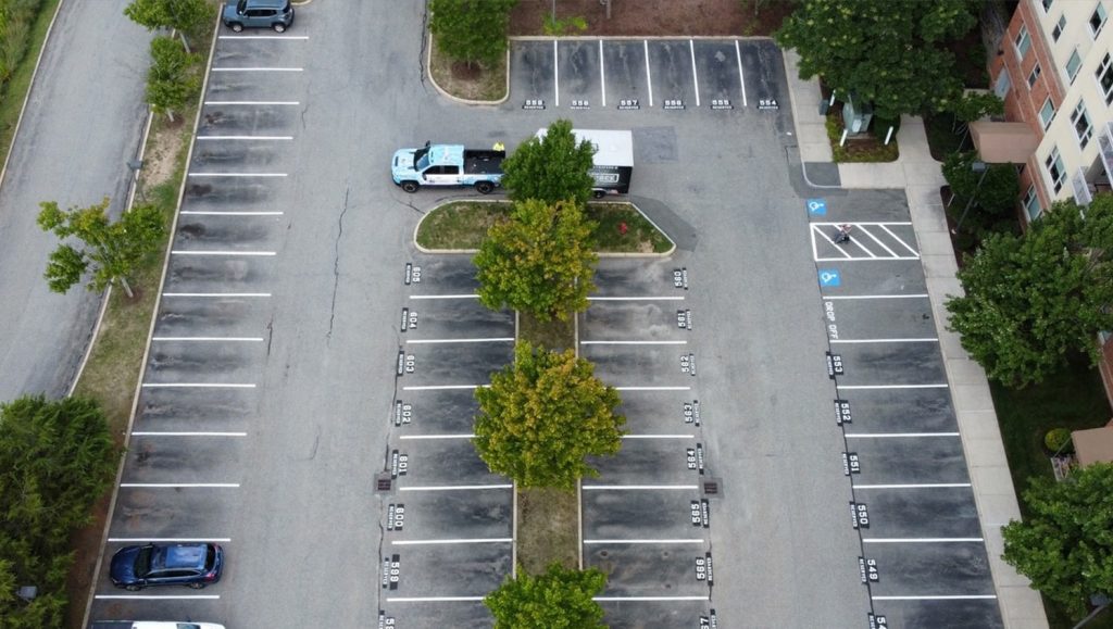 Brooksby Village parking lot freshly painted aerial view