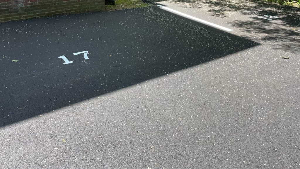 close-up of freshly painted number on parking spot for EJ Paving