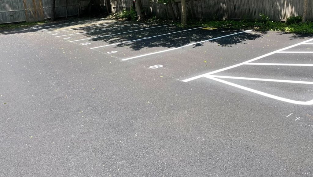 EJ Paving parking lot with freshly painted line striping