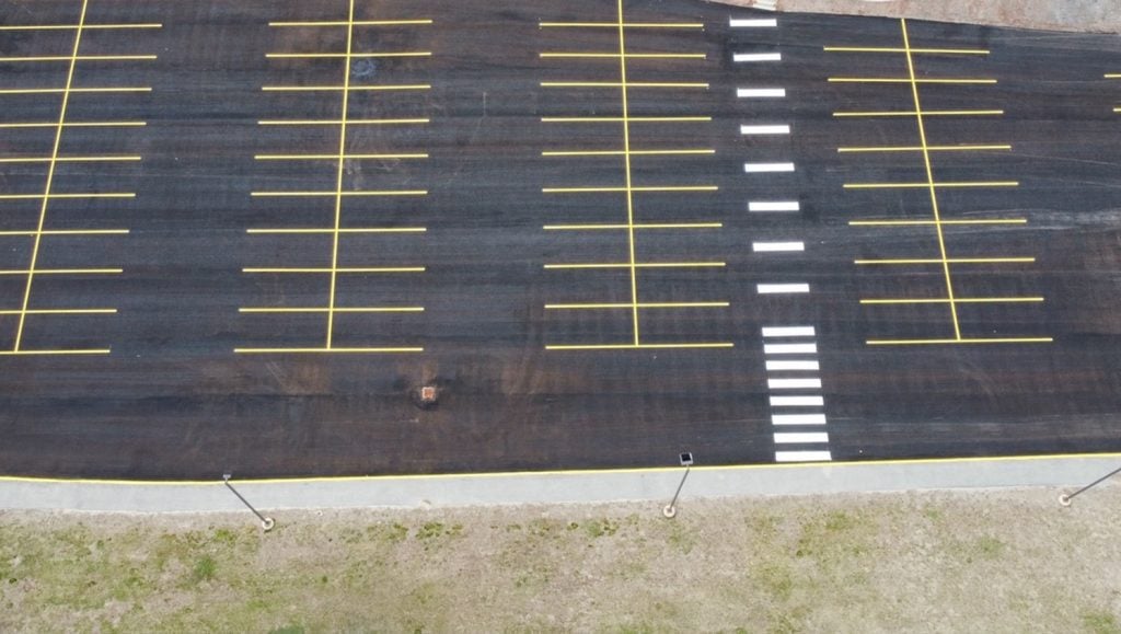 aerial view of Lowell Hospital parking lot freshly painted