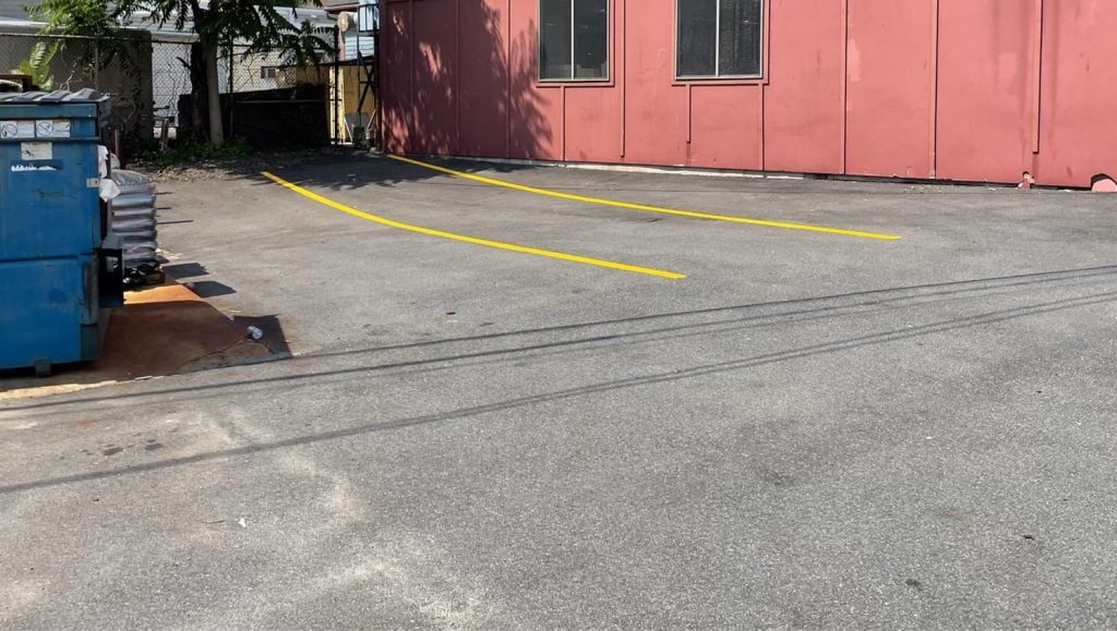 yellow line markings for Somerville Facilities Services parking lot