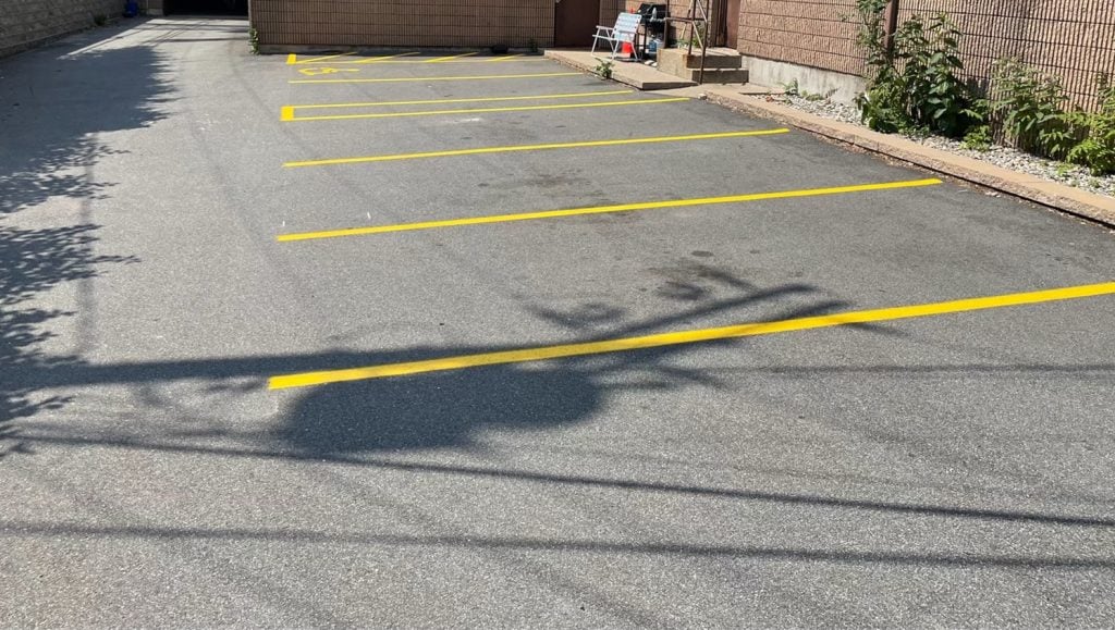 freshly painted parking spots for Somerville Facilities Services parking lot