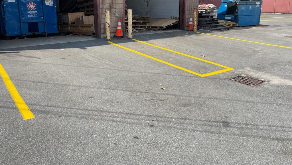 close-up of line striping freshly painted for Somerville Facilities Services parking lot
