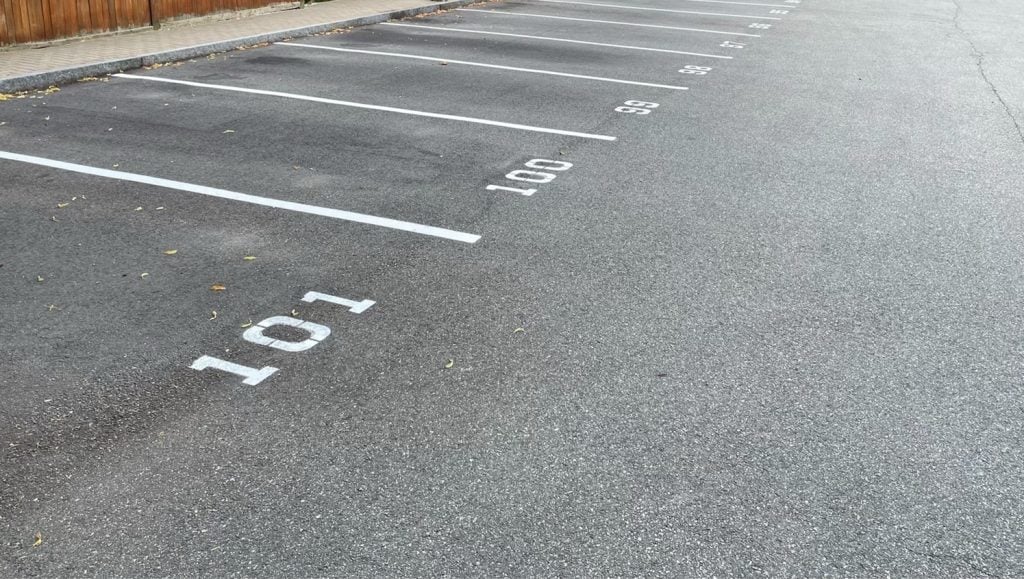 close-up of Skyline Realty parking spots freshly painted