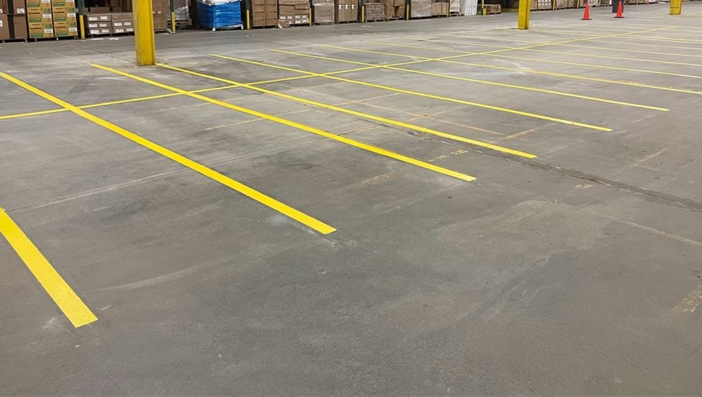 yellow line markings freshly painted for HD Supply warehouse