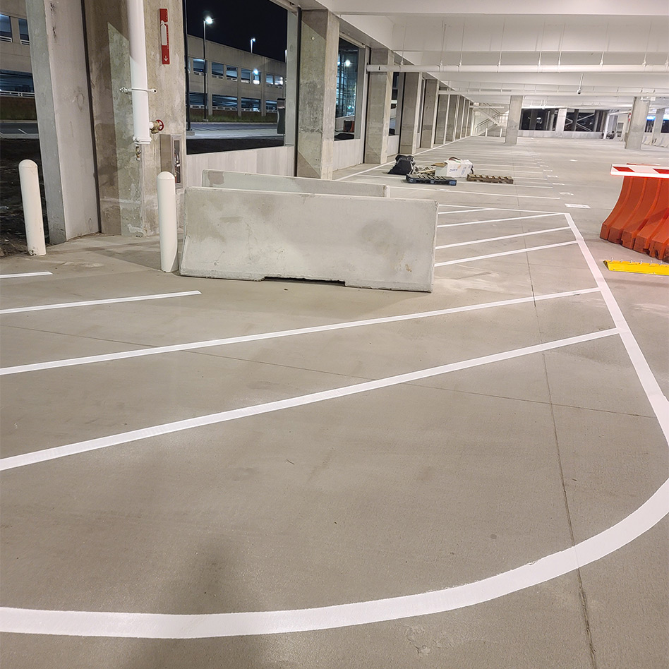 new parking lot striping inside parking garage