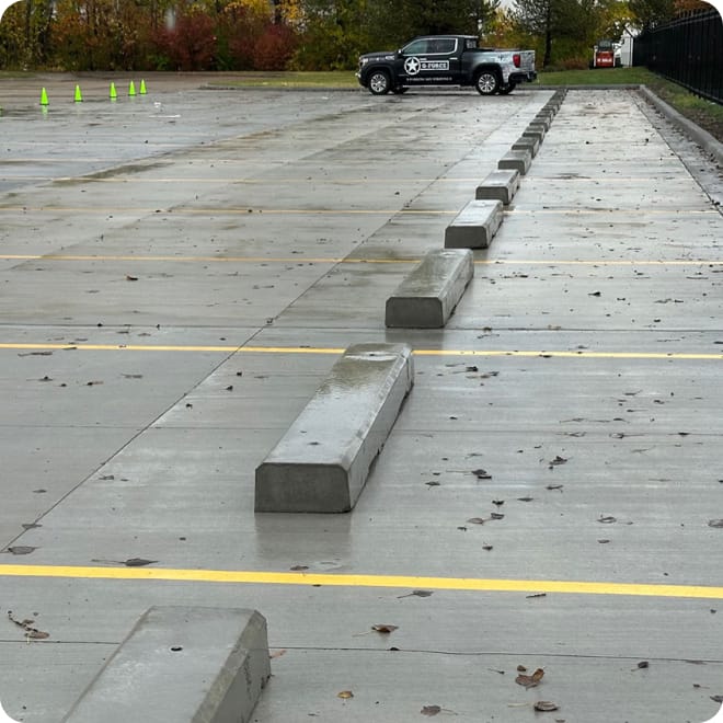 wheel stop installation in parking lot